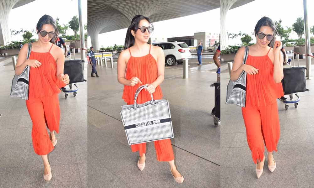 Kiara Advani in tangerine co-ords at the airport