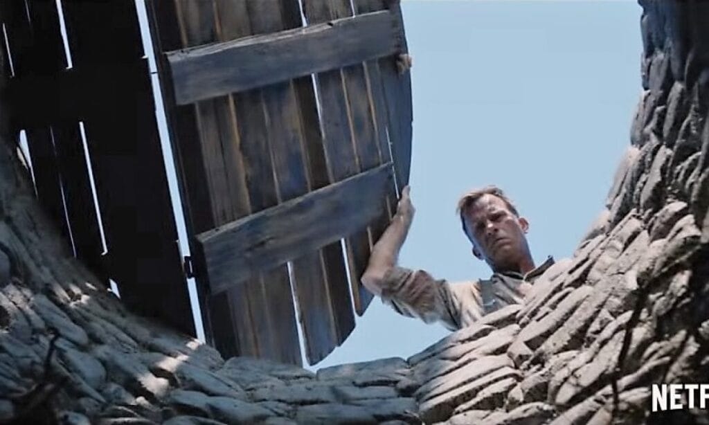 Dark farmhouse scene from Stephen King adaptation 1922 on Netflix