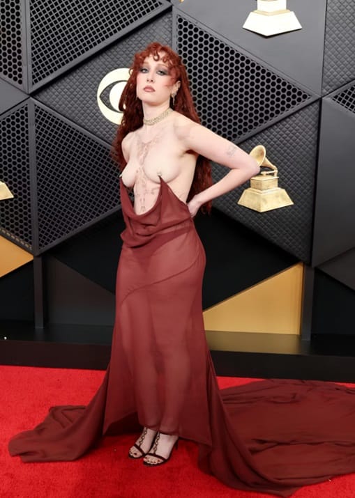 Chappell Roan in a nude Roman-inspired archival Rodarte gown presenting the Best New Artist award at the 2026 Grammys